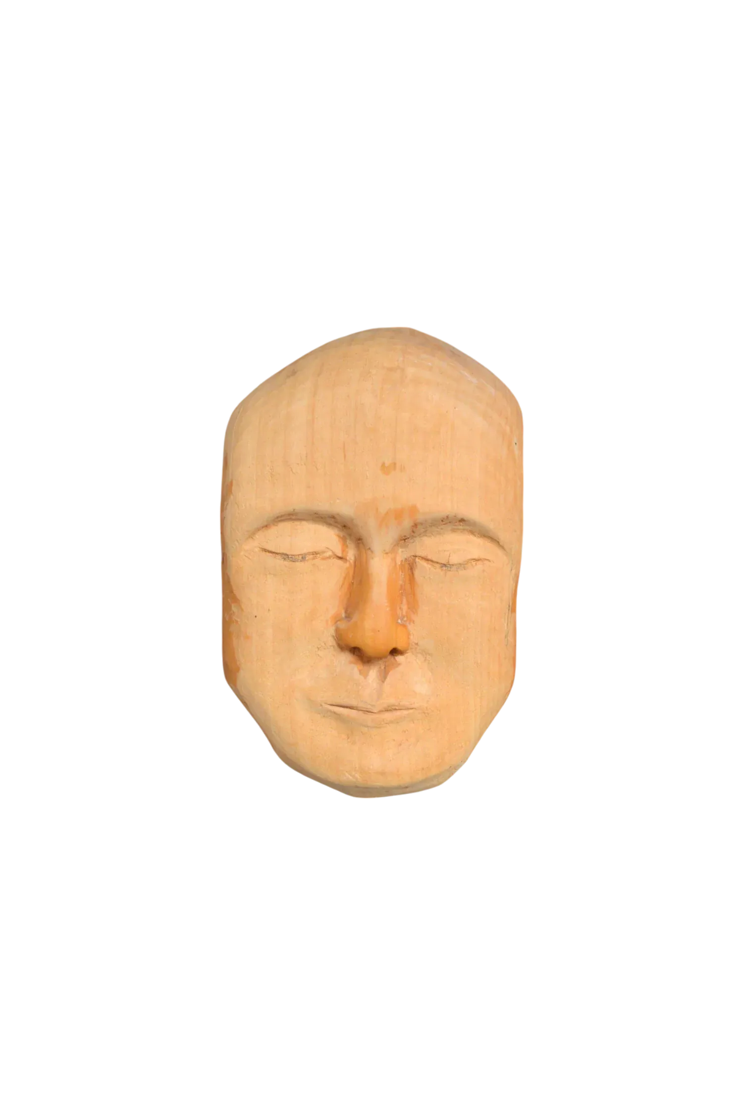 Visage en bois sculpté